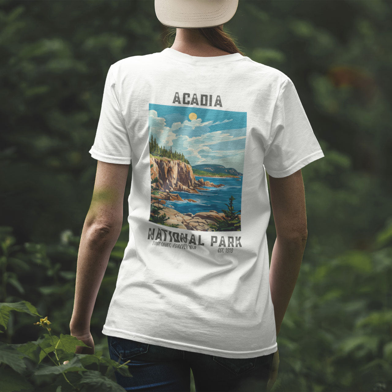 woman wearing acadia national park t-shirt in forest