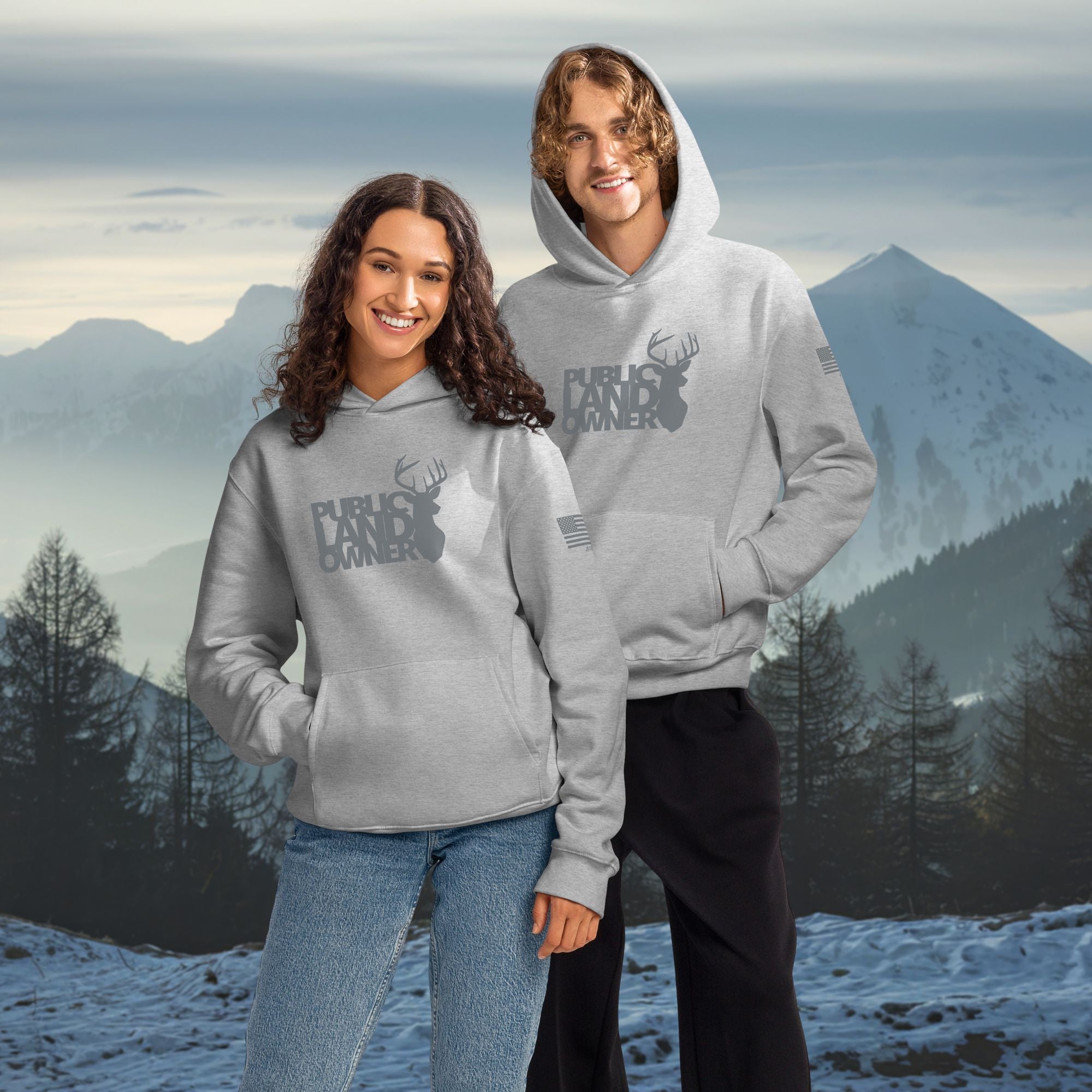 Public Land Owner Hoodie grey on man and woman outside