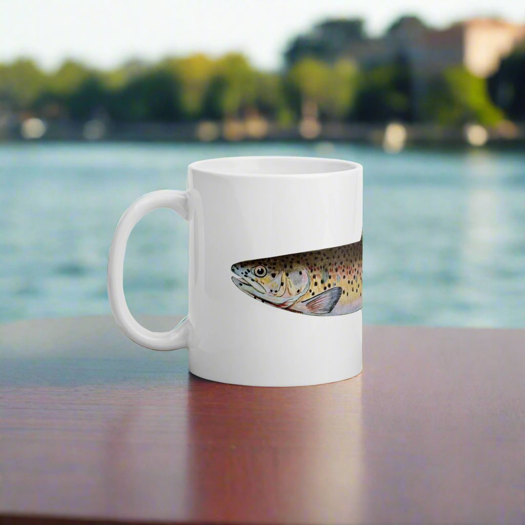 red throat trout coffee mug on a table