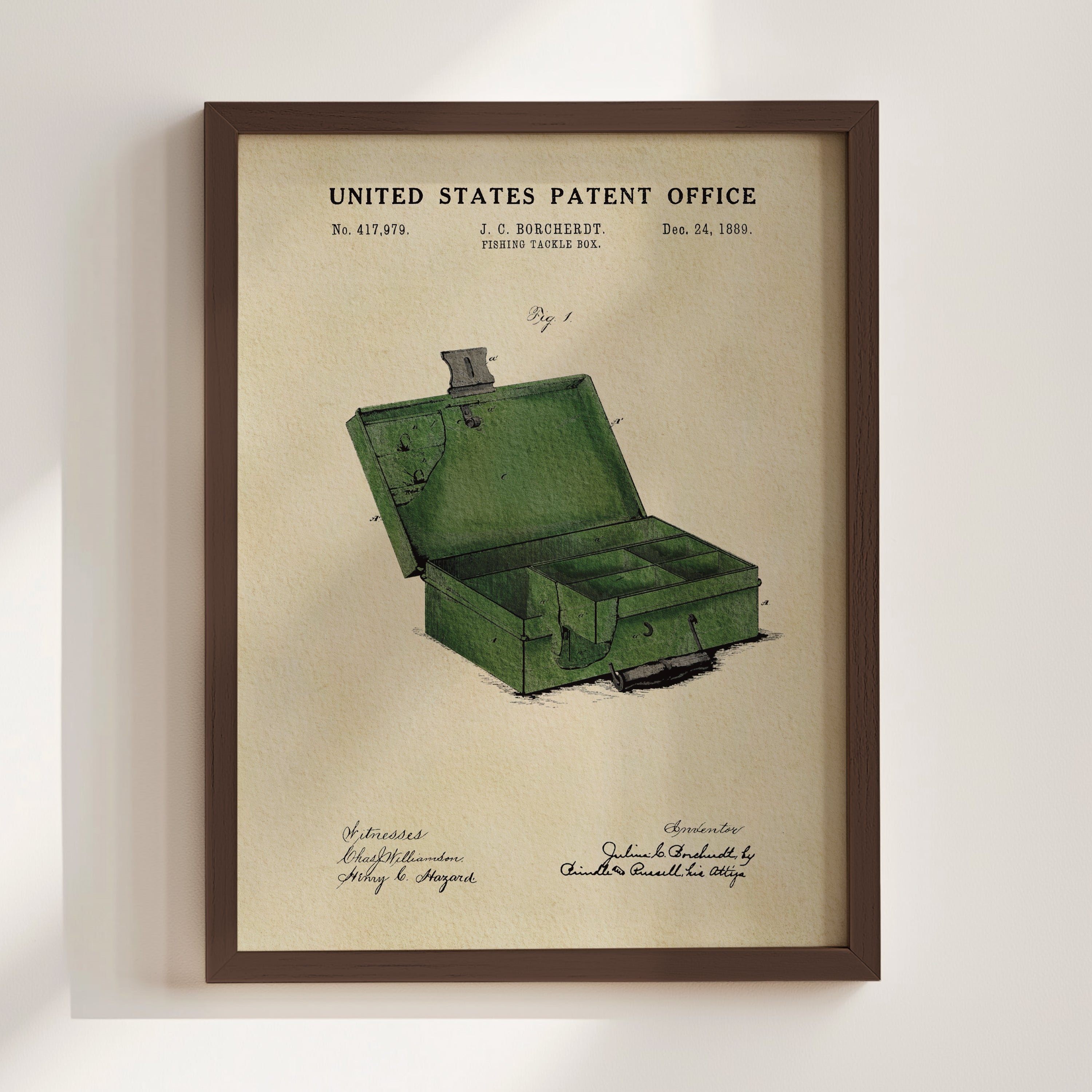 Julius Borcherdt 1889 Fishing Tackle Box patent print displayed in a walnut frame.