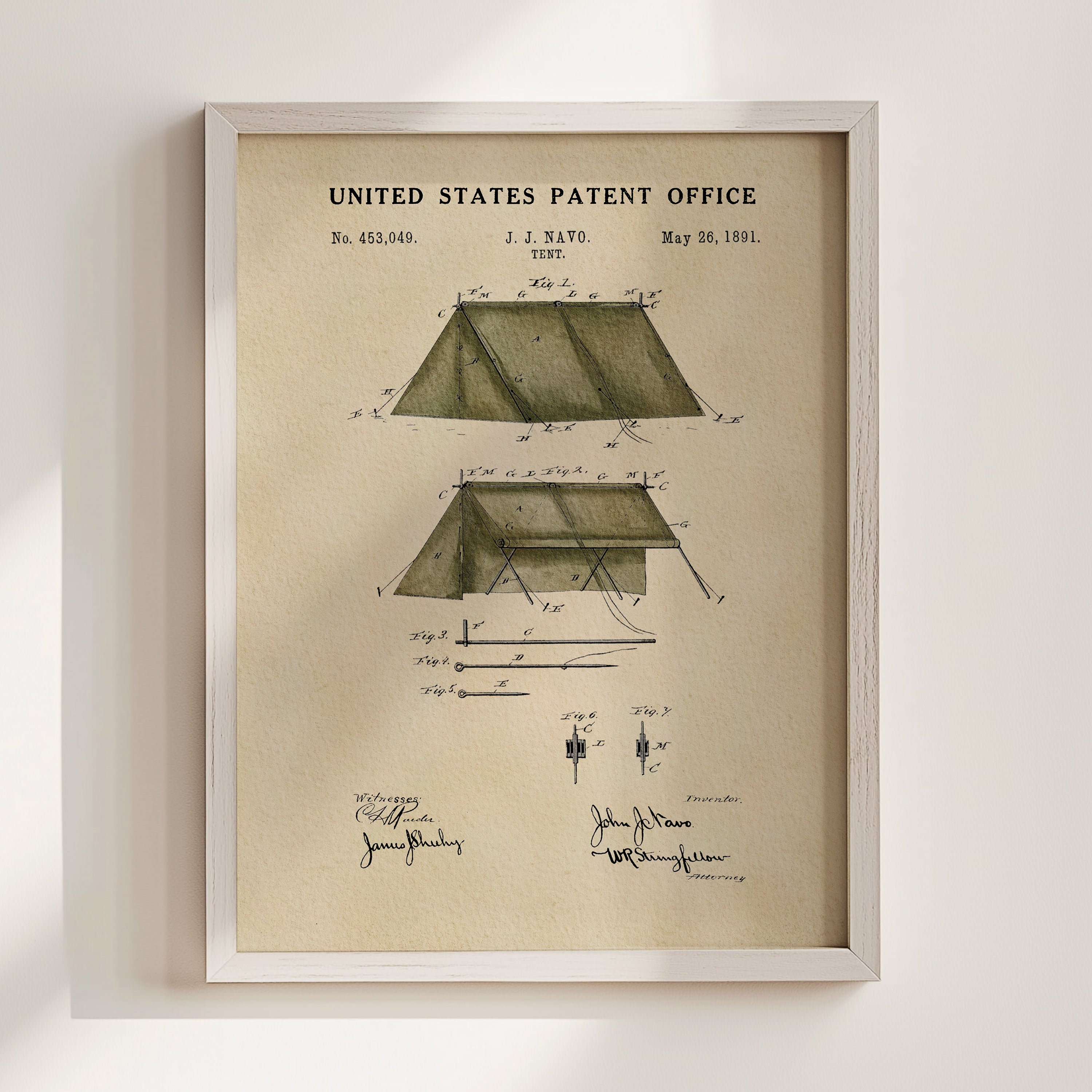 1891 tent patent print displayed in a white wood frame.