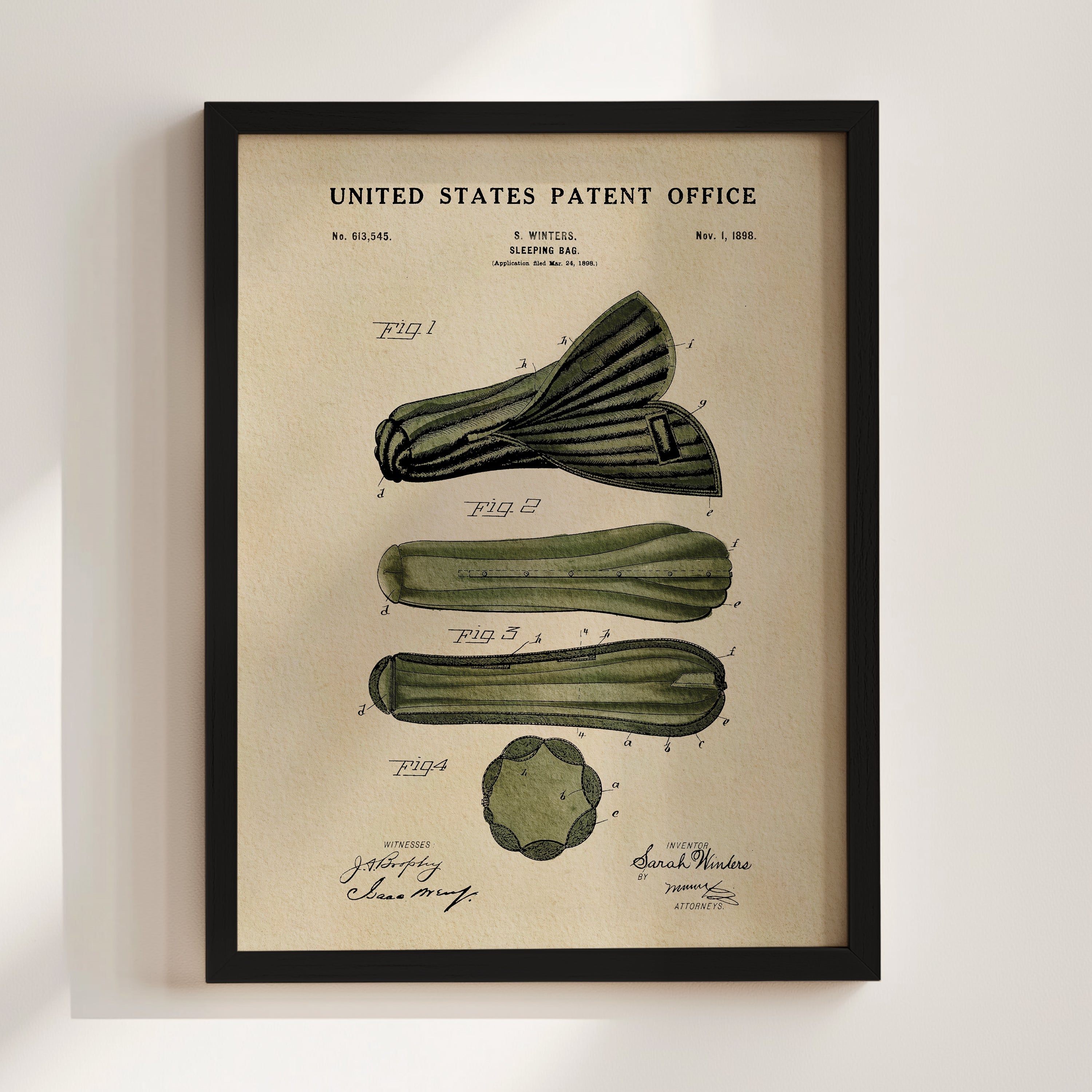 Framed Sleeping Bag patent print displayed as classic camping wall art on a light wall.