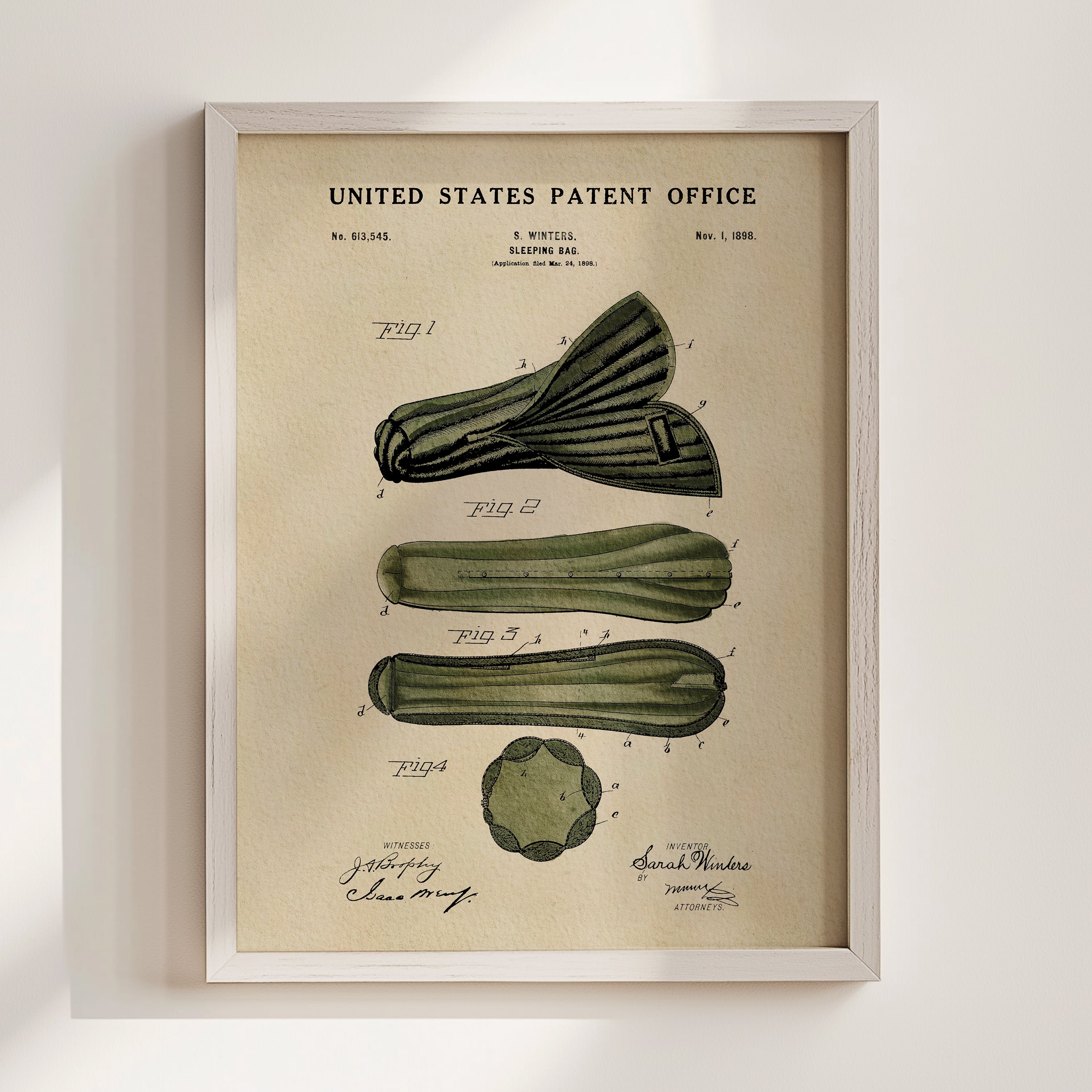 1898 Sleeping Bag patent print displayed in a white wood frame.