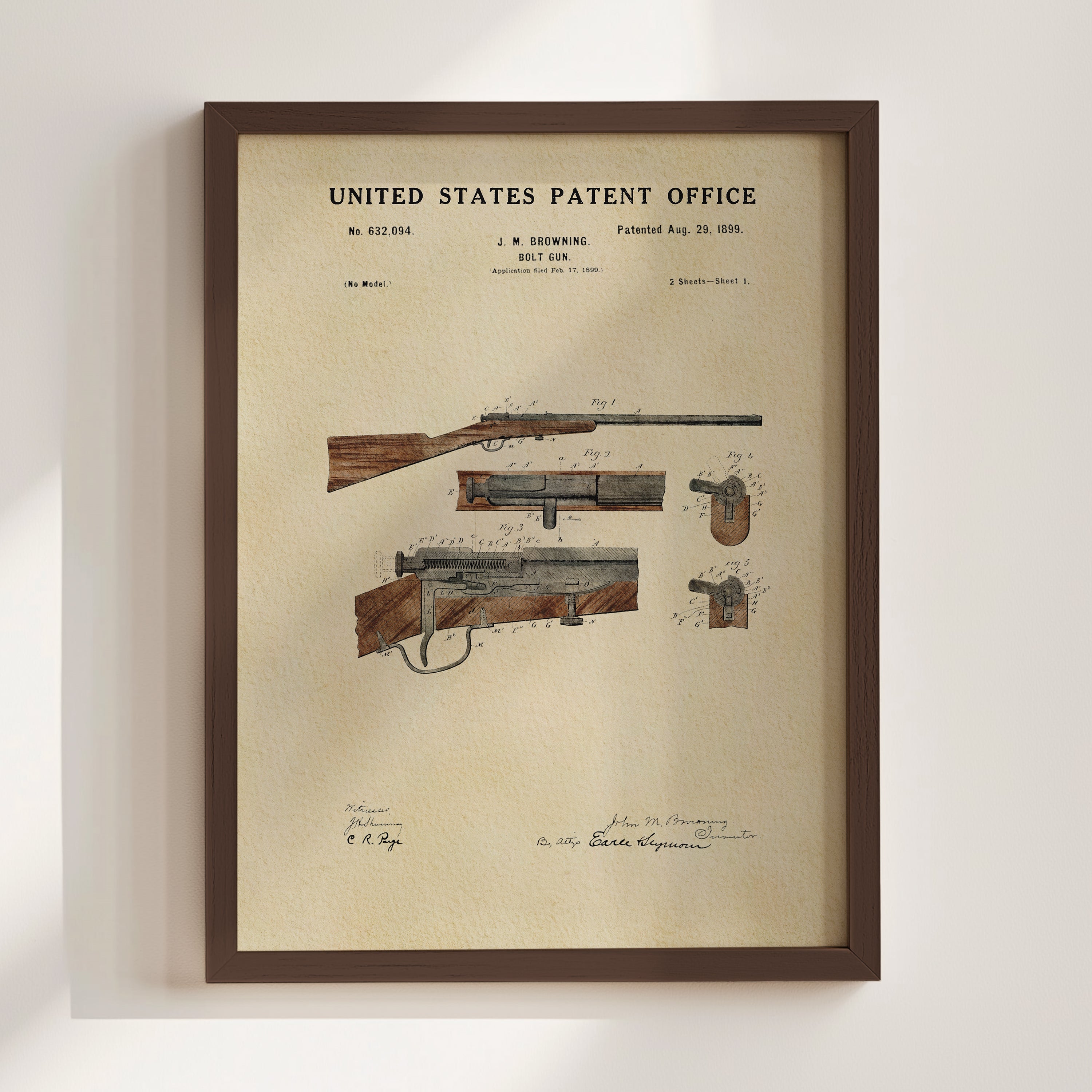1899 John M. Browning Hunting Rifle patent print displayed in a walnut frame.