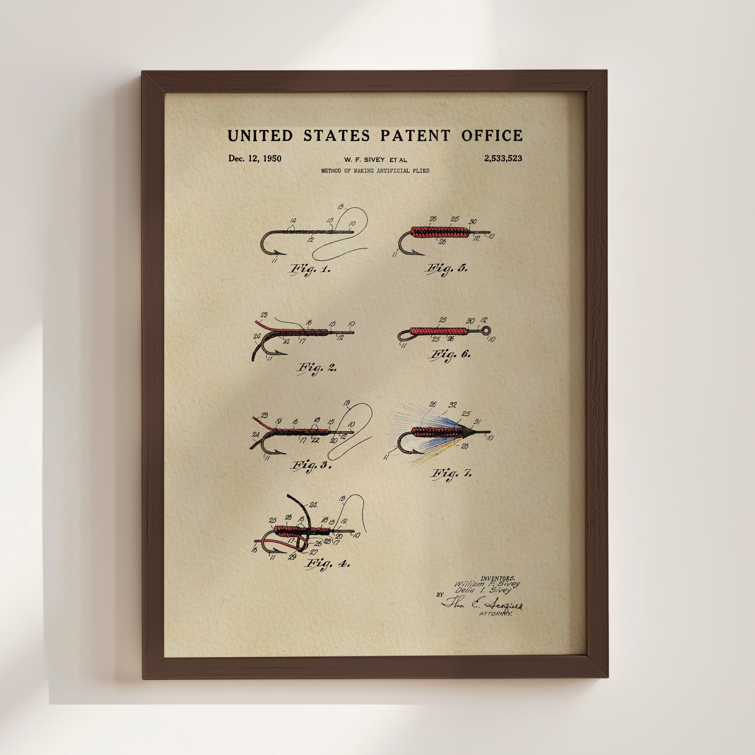 William F. Sivey 1950 fly fishing flies patent print displayed in a walnut frame.