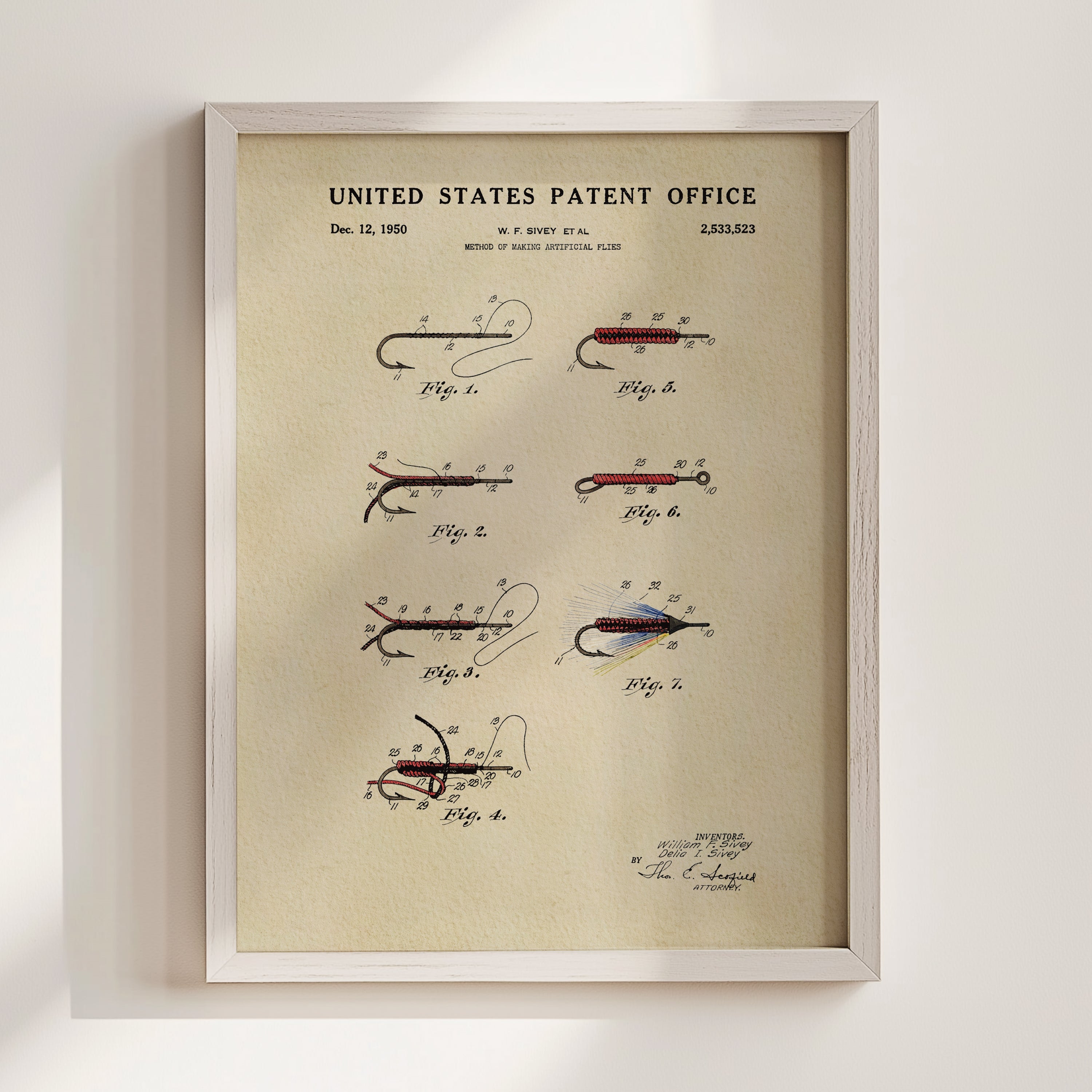 1950 Fly Fishing Flies patent print displayed in a white wood frame.