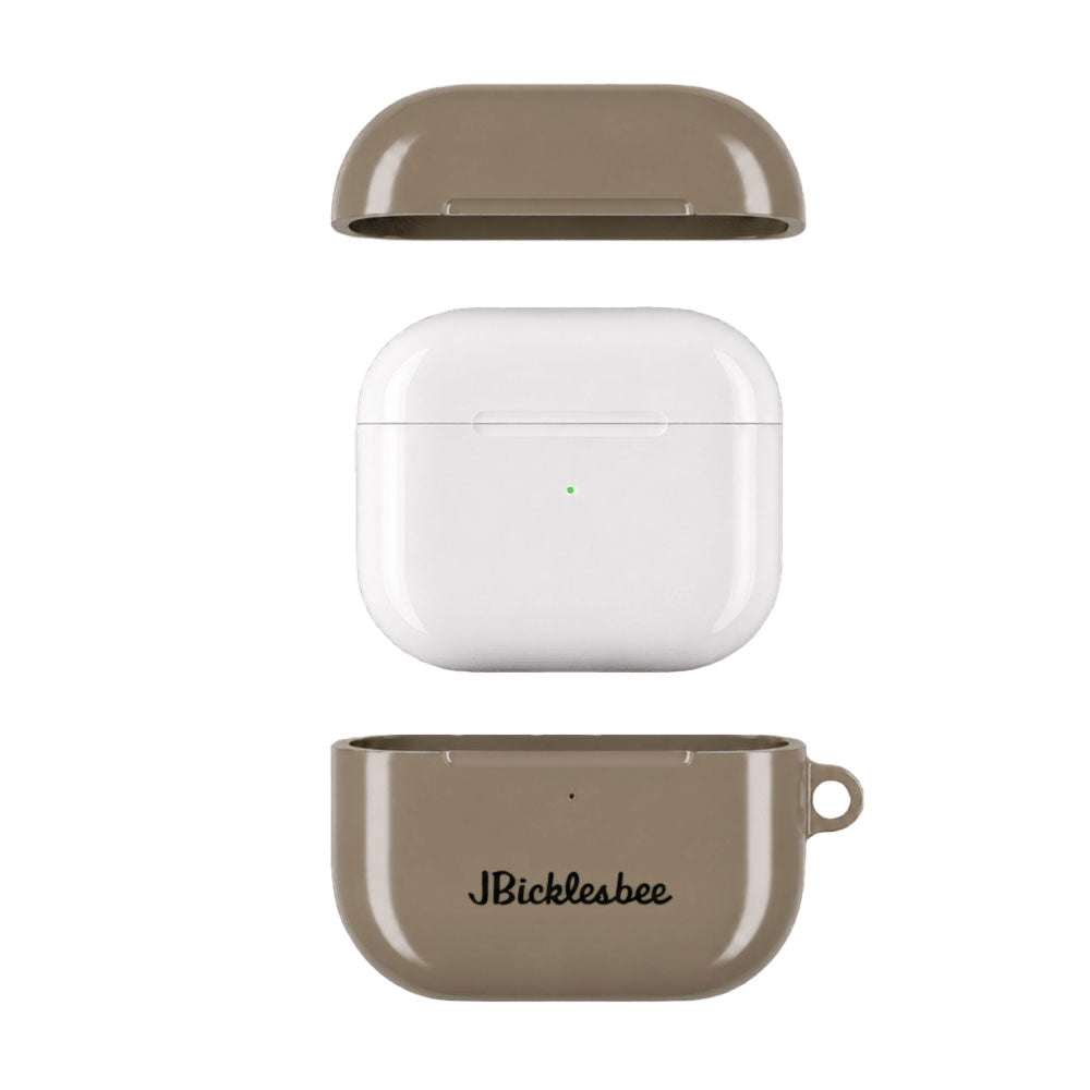 Exploded view of an Flat Dark Earth AirPods case with top and bottom cover pieces surrounding the AirPods charging case