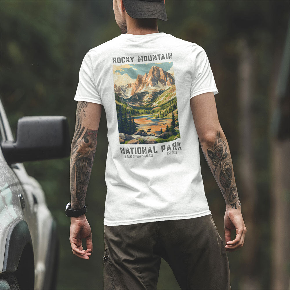 man wearing Retro Rocky Mountain National Park T-shirt near truck