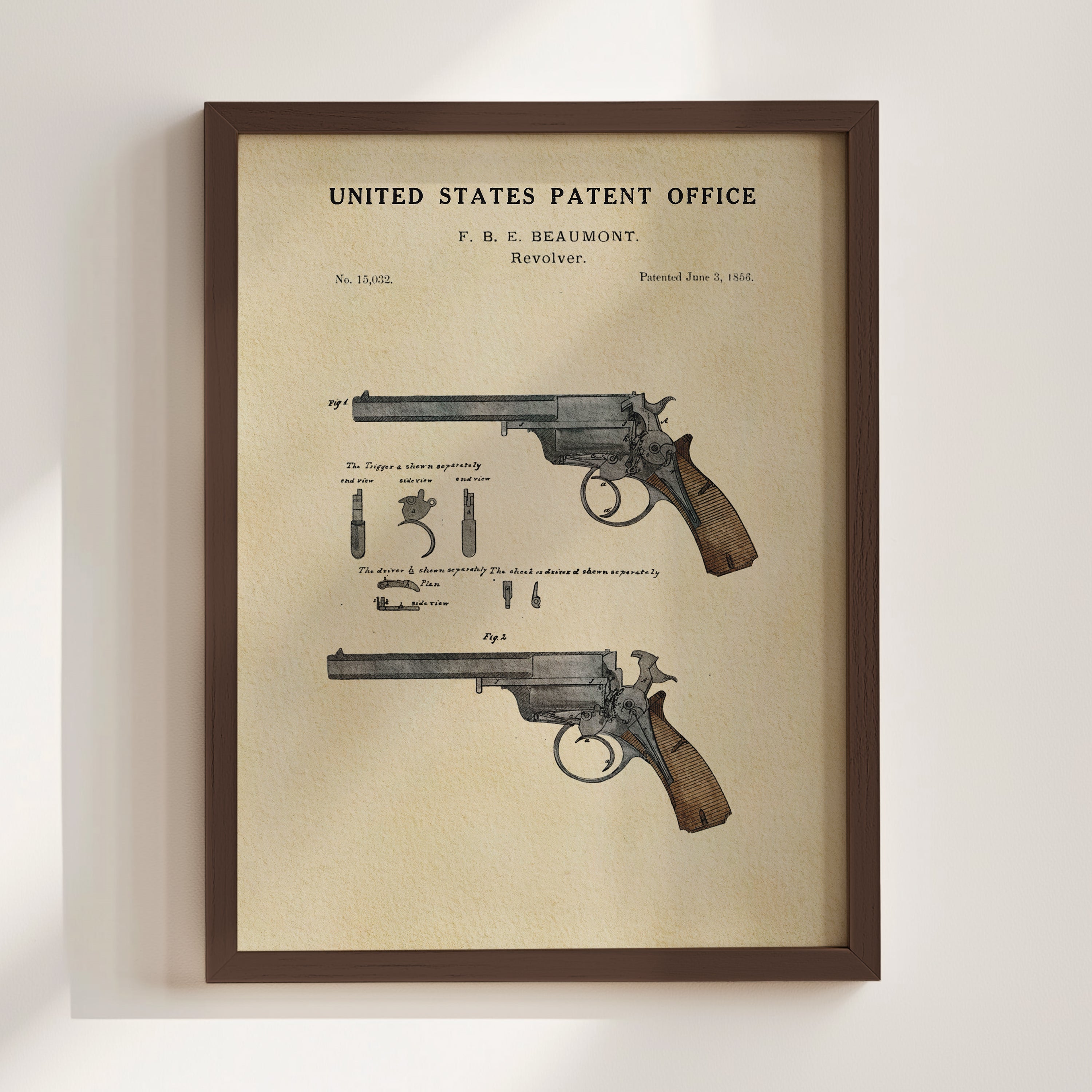 Beaumont Revolver patent print displayed in a walnut frame