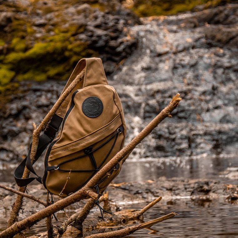 Duluth Pack 16L Canvas Sling Pack in a natural outdoor setting