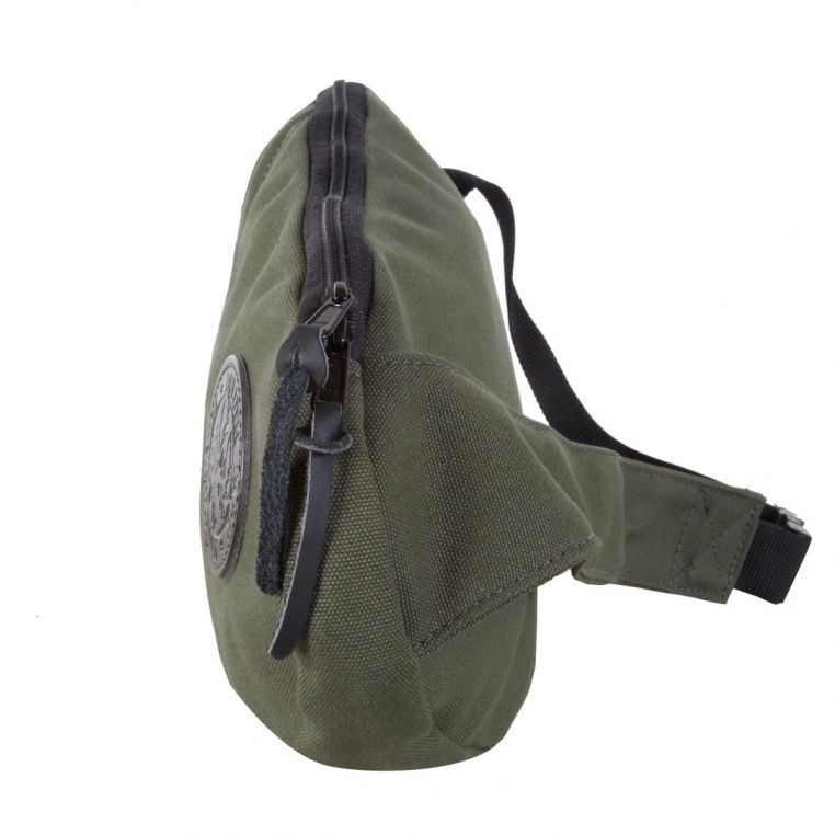Side view of the Duluth Pack 16L Canvas Sling Pack showing its compact profile