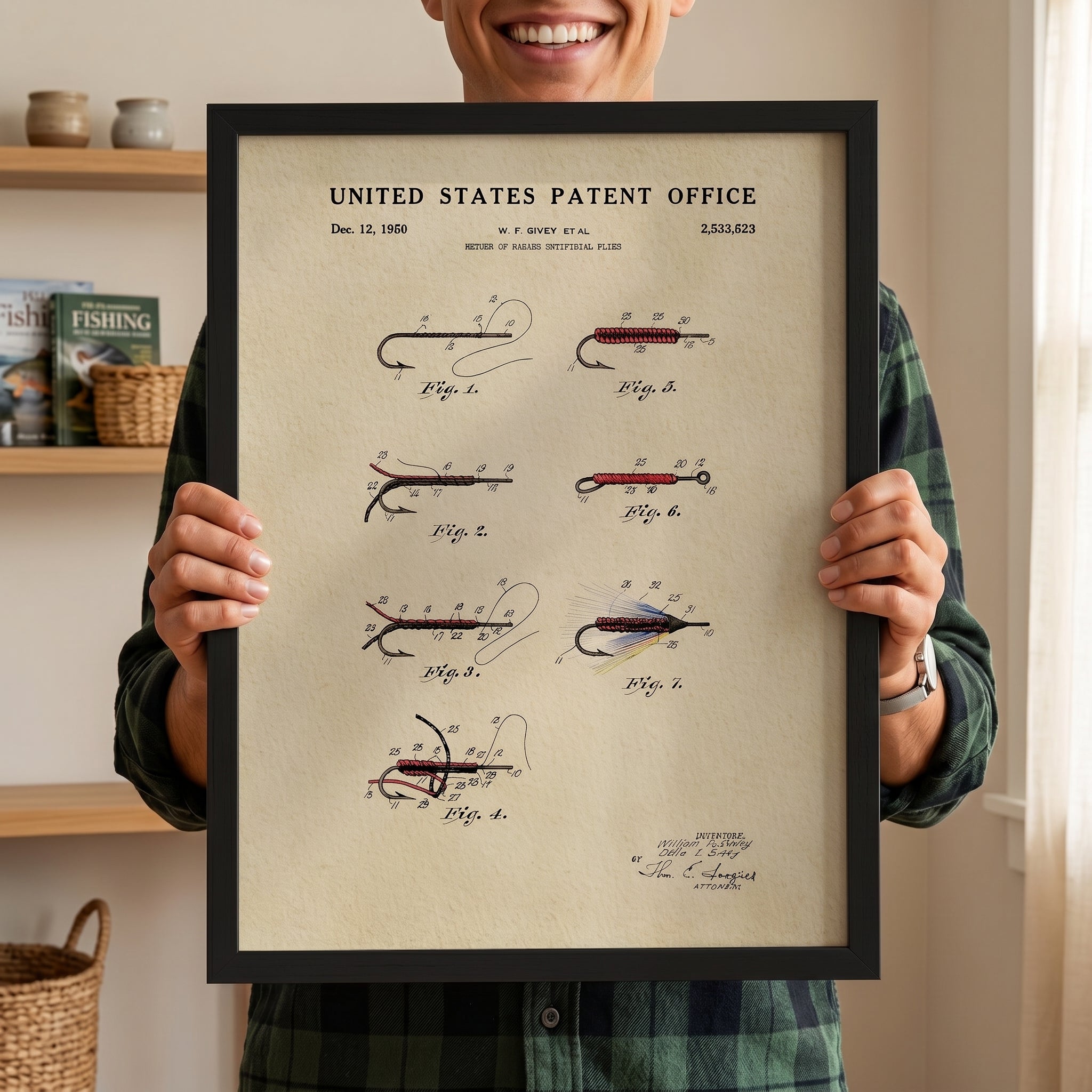 Person holding a large framed 1950 Fly Fishing Flies patent print to show scale.