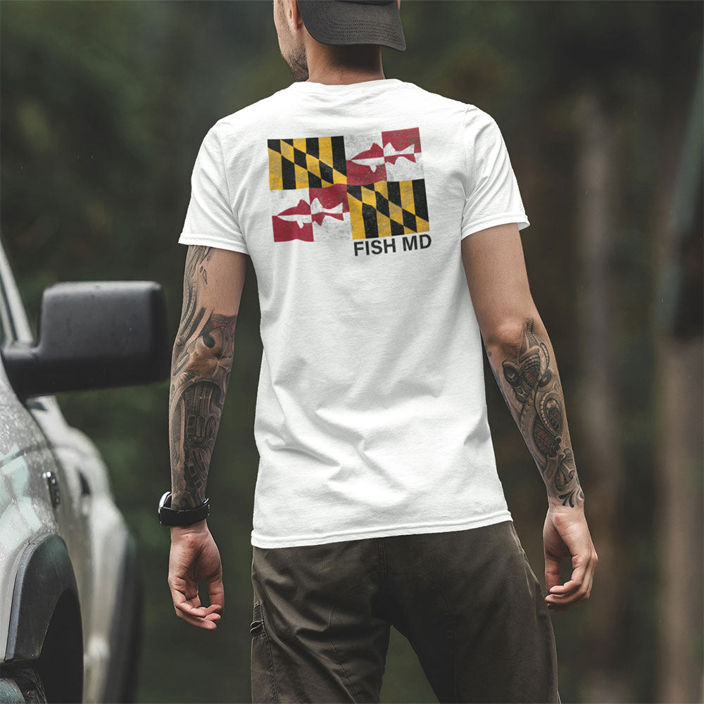 man wearing MD flag rockfish tshirt near truck