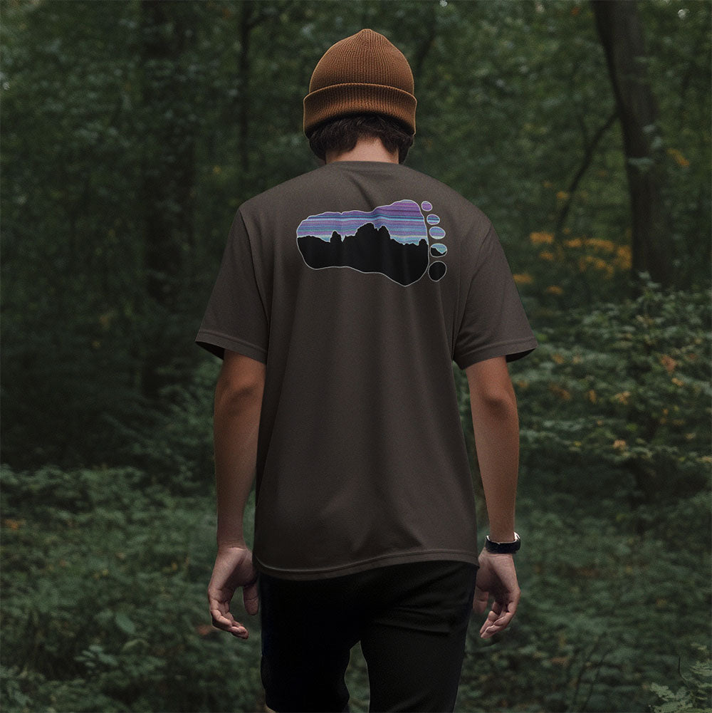 man wearing BELIEVE Bigfoot Sasquatch T-shirt