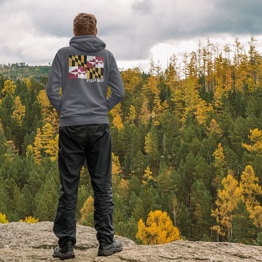 man wearing Maryland Flag "Striper" Rockfish Hoodie outdoors 