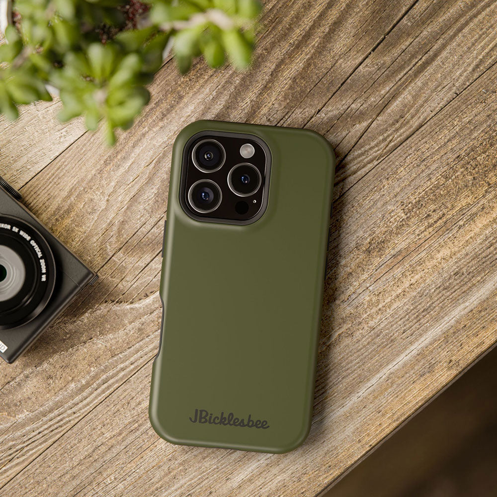 OD Green MagSafe iPhone Case on a rustic wood surface 