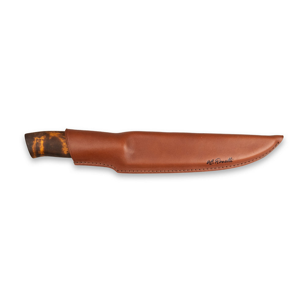 Roselli Big Fillet Knife stored in dark vegetable-tanned leather sheath