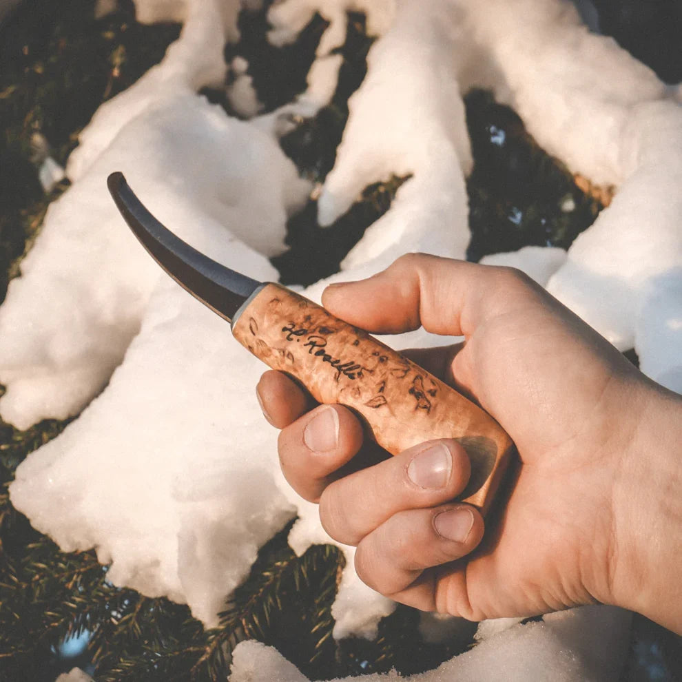 Roselli R161 Opening Knife being used outdoors for field dressing game