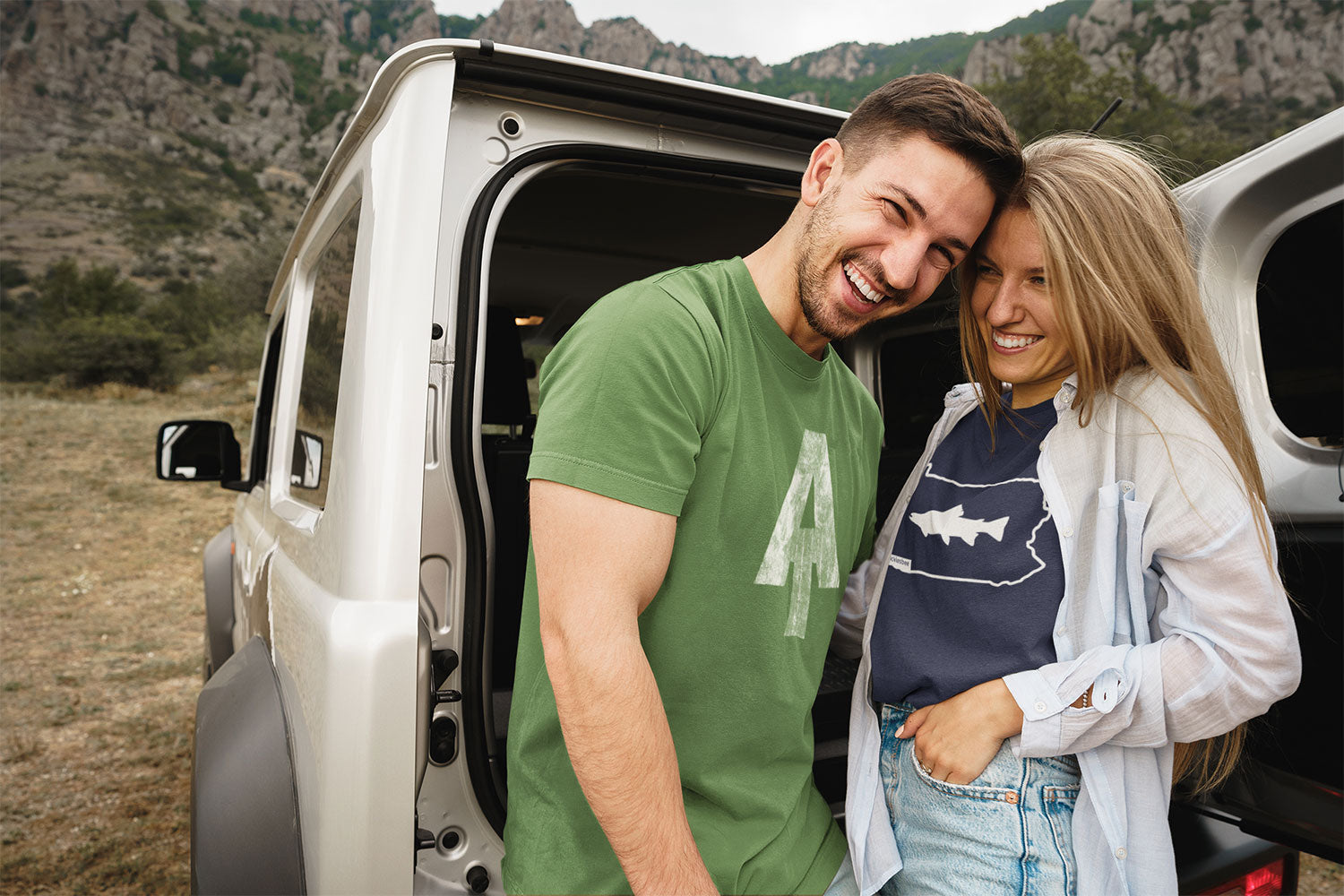 happy couple in nature with JBicklesbee t-shirts on